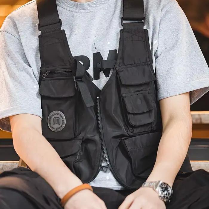 Veste tactique pêche multi-poches avec sac solide et bretelles larges pour équipement
