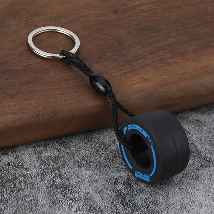 Porte-clés pneu caoutchouc souple - Accessoire pêche unisexe corde sac à dos cadeau