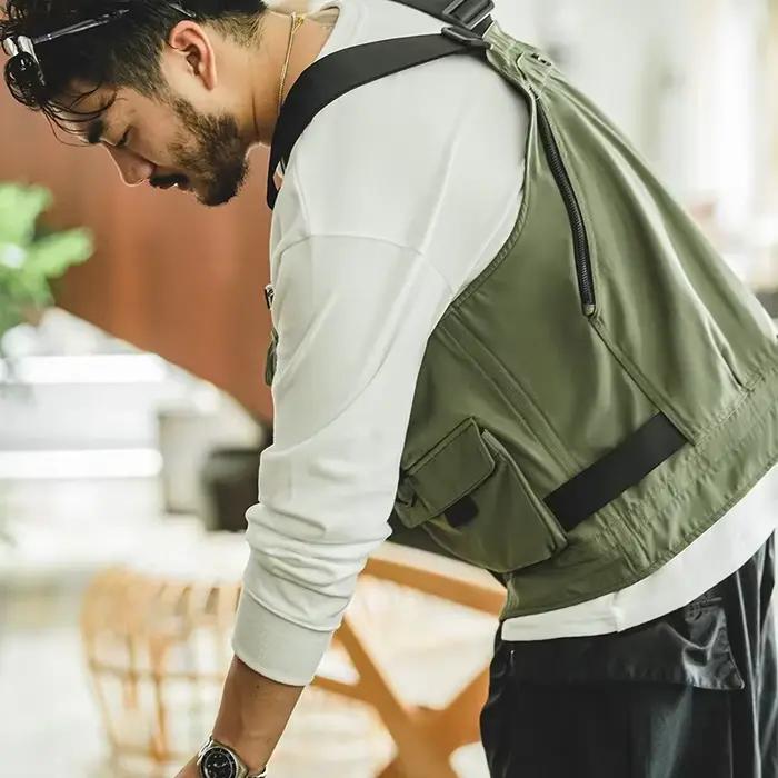 Veste tactique pêche multi-poches avec sac solide et bretelles larges pour équipement