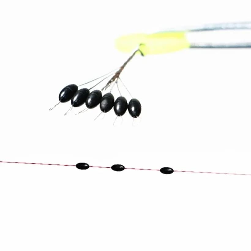 Stop float caoutchouc silicone forme haricot - Bouchon ovale noir pêche carpe et mouche