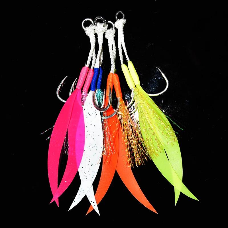 Set de 4 jigs métalliques avec jupe silicone et hameçons assist double acier carbone pour pêche en mer