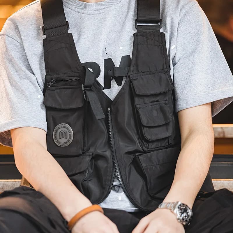 Veste tactique pêche multi-poches avec sac solide et bretelles larges pour équipement