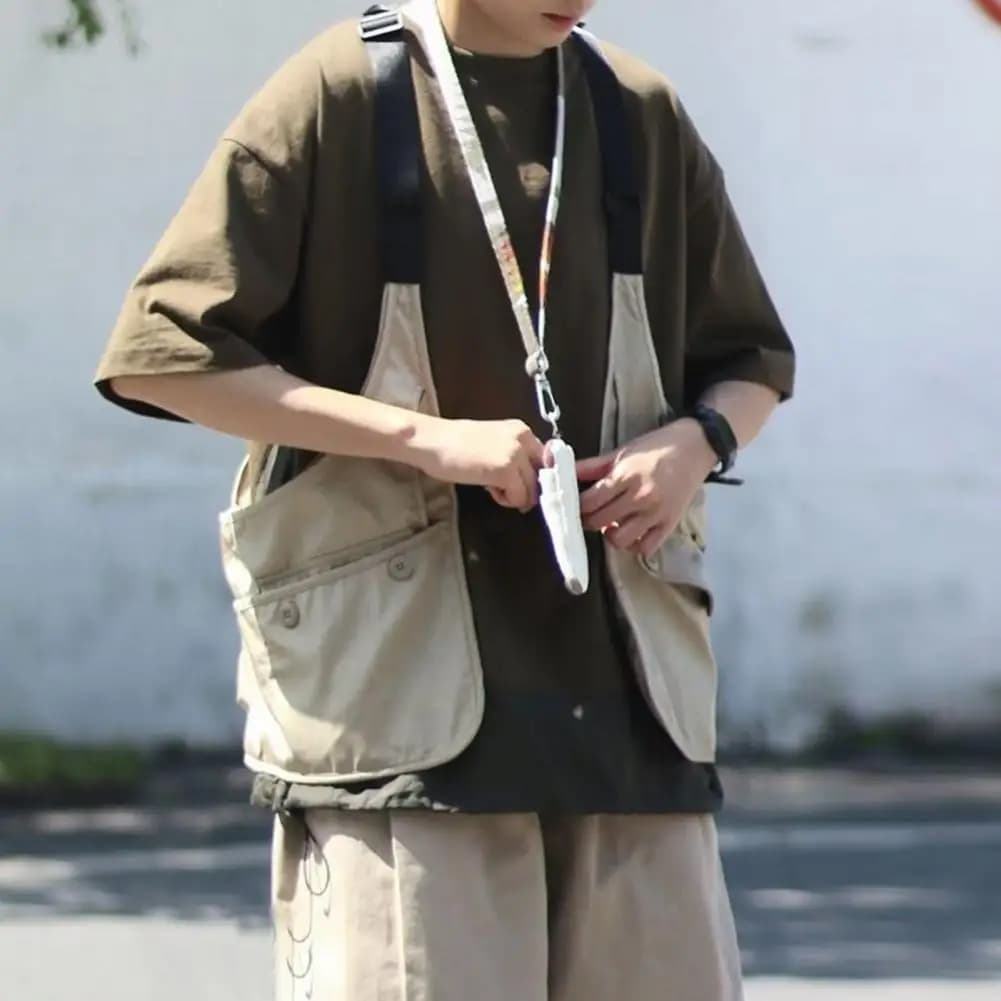 Gilet à poches multiples style streetwear pour pêcheurs avec rangements pratiques accessoires
