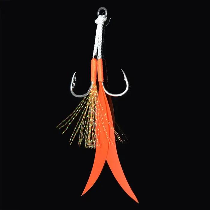 Set de 4 jigs métalliques avec jupe silicone et hameçons assist double acier carbone pour pêche en mer